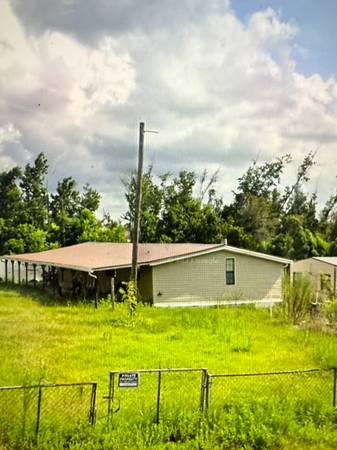 $140,000 / 3br - 1800ft2 - Large House with long covered porch and metal roof. Large double Lot!! (Panama City)63924679645955123