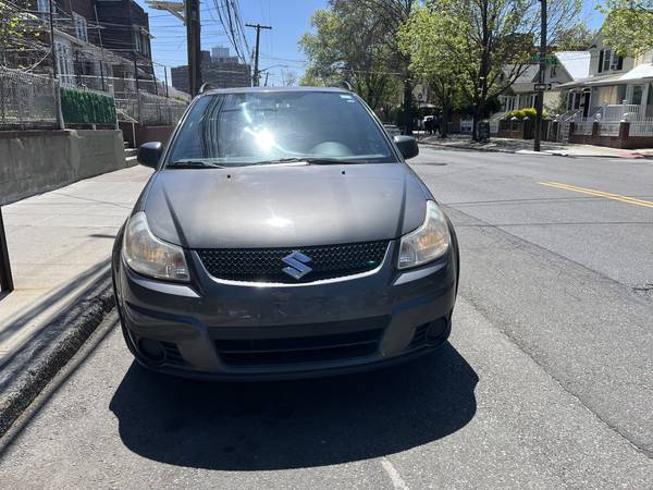 2012 SUZUKI SX4 AWD 4D HATCHBACK CROSSOVER - $2,400 (Elmhurst)63654724608769120