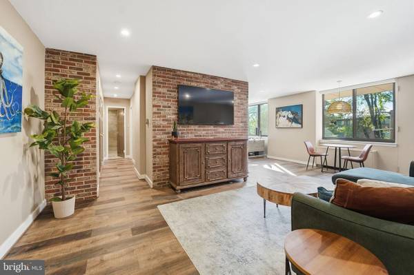 Beautifully designed, this freshly painted 2-bedroom, 2-bath condo 1