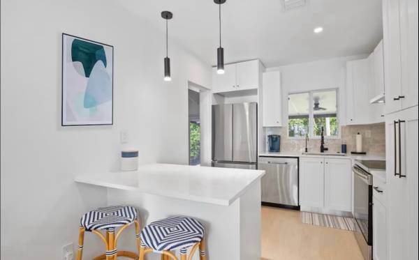 2 white and blue stools 1