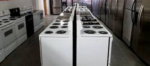 Regular mid-size top bottom refrigerator & stove ranges 1