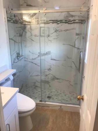 Shower door on sale. Kitchen cabinet, quartz, counter top, floor...... 1