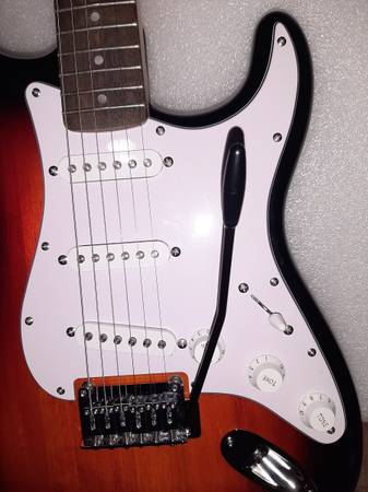 Squire stratocaster guitar and amp 1