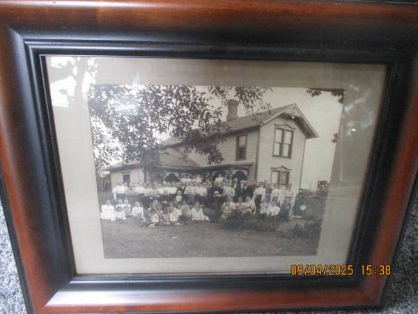 Framed picture of people in the 1800's. 1