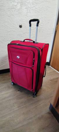 Suitcase with wheels and handle 1