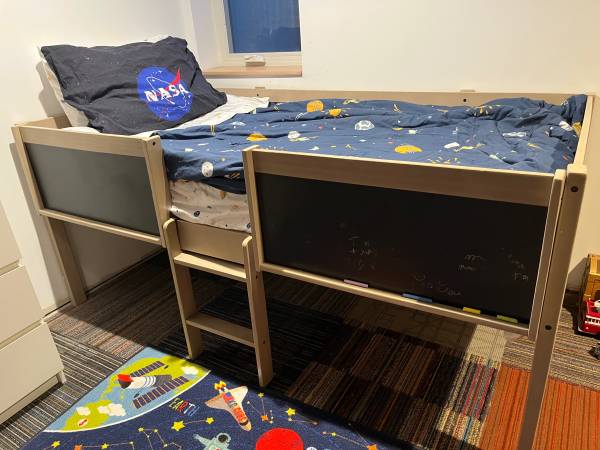 Child’s elevated bed with chalkboards 1