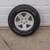 BRAND NEW GOODYEAR WRANGLER ST 255/75/R17 TIRE AND JEEP RIM 1 thumbnail