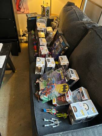 Collection of Funko Pop Dolls and Action Figures 1