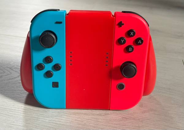 Authentic Nintendo Switch Joy-Con Controllers + Grip Red & Blue 1