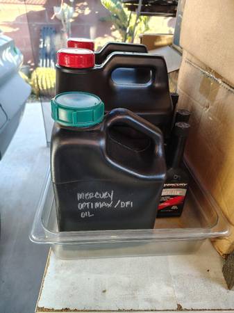 Two and a half gallons of  Mercury Optimax motor oil 1