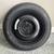 Brand new, never installed spare tire T135/80D15 99M + wheel 5 thumbnail