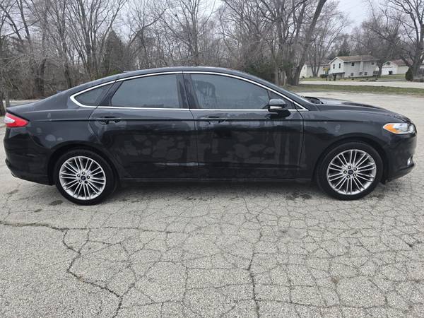 2015 FORD FUSION - $5,999 (ZION ILLINOIS)63619080604801124