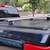 Ford F-150 Retrax bedcover with Rhino Rack Cross bars 3 thumbnail