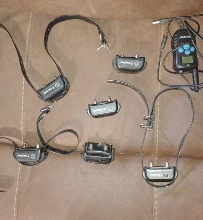 1 Petrainer Remote control,6 Receivers,3 Collars,Charger cord, 1