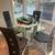 Round Glass Dining Table with 4 Matching Black High-Back Chairs 1 thumbnail