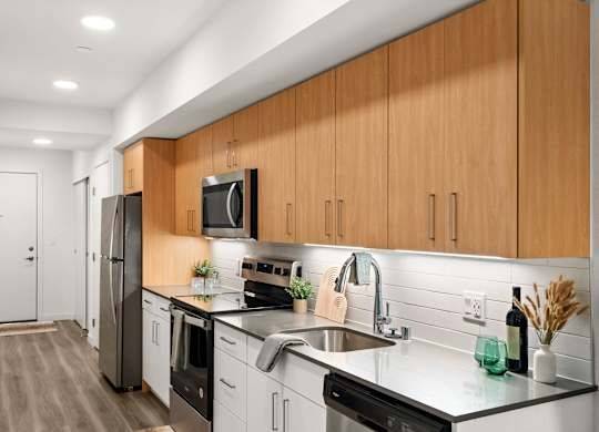 $3,480 / 2br - 1068ft2 - The Backyard, Ceiling Fans, Modern Kitchens (10712 5th Ave NE, Seattle, WA)63808107293697124