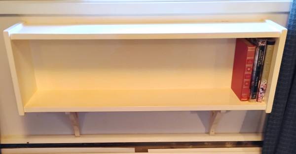 WALL-MOUNTED BOOKCASE, CUSTOM-MADE 1965. 38" x 18" x 8" 1