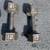 Two (2) 12 lb gray hex dumbells and one (1) yellow 10 lb kettlebell 2 thumbnail
