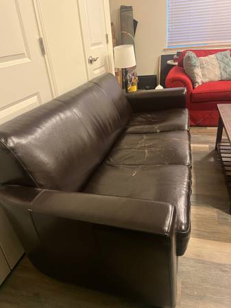 Free lightly worn faux leather sofa 1