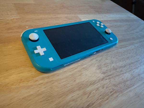 Nintendo Switch Lite (light blue) - video gaming - by owner
