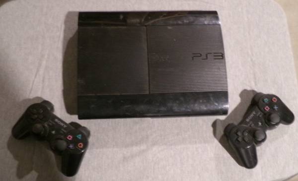 PlayStation 3 Super Slim 500GB + 2 Controllers + 15 Games – Tested & 1