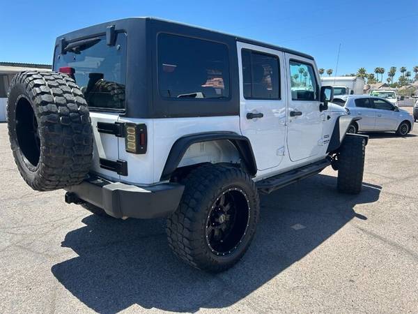 2015 Jeep Wrangler Unlimited Sport - $18,49963470597016833124