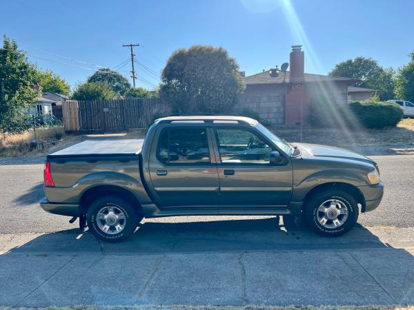 2005 Ford sports track 4X4 quad cab 4 door automatic low miles. - $5,100 (Orangevale)63619211193345123