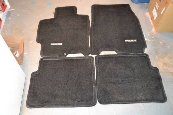 Mazda 626, Protege or Mazda equivalent rear original oem car mats 1