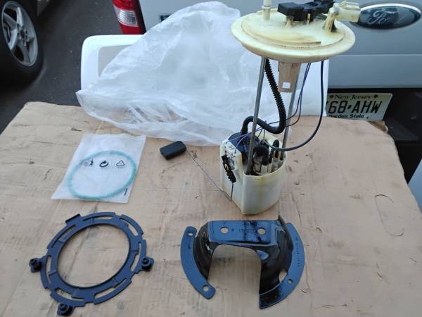 2017 Ford F-350 Complete Fuel Pump, O- Ring, Locking Ring,& Cover OEM Factory. 1