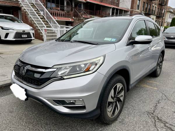 2015 Honda CRV Touring AWD 40k millas originales 1 dueño funciona perfecto - $16,999 (Brooklyn)63614327416067120