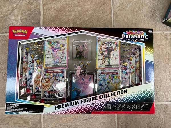 Pokemon Prismatic Evolutions Premium Figure Collection in hand 1