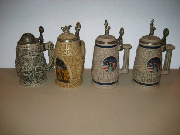 Lidded Avon Steins 1