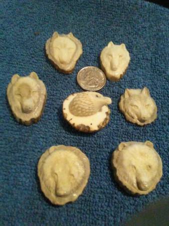 Hand carved elk horn bear, wolves and eagle 1