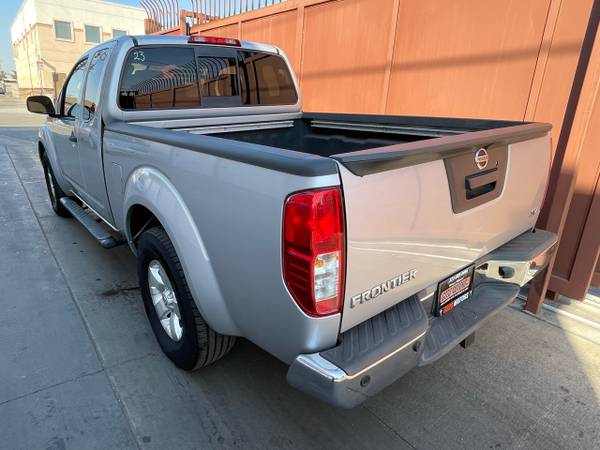 2013 Nissan Frontier SV V6 King Cab 2WD - $12,900 (5104 East Olympic Blvd.)63624631681539123