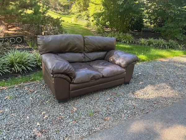 Leather couch on curb good for kids gaming room 1