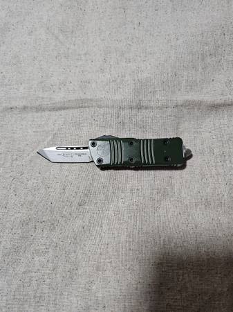 Microtech, troodon mini pocket knife. 1