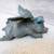 Solid Metal Flying Pig at rest flat forest green patina 2 thumbnail