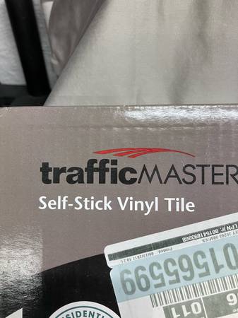 Traffic Master self and stick tile. 1