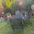 WROUGHT IRON GARDEN/PATIO TABLE AND 4 SPRINGY CHAIRS 4 thumbnail
