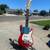 Good condition used red Squier Mini guitar + strings 1 thumbnail