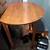 small wooden table w/expandable wings & 4 stools 1 thumbnail