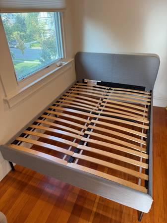 FREE Blue upholstered full-size bed frame 1