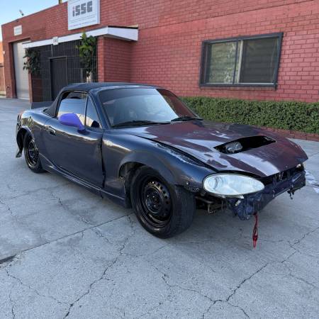 2002 Mazda Miata with a MANUAL TRANSMISSION! - $3,200 (90248)63615926372483120