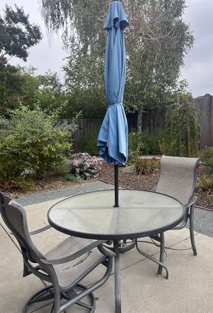 Outdoor patio set with newer umbrella 1