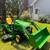 John Deere 1023e compact tractor with a loader and 60 inch deck 8 thumbnail