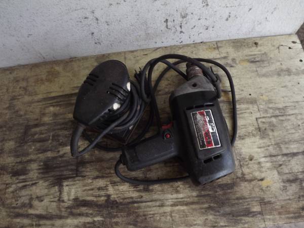 Hand sander and a drill 1
