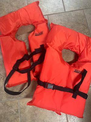 2 Orange Childs Life Vests 1