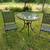 Outdoor table and 2 folding chairs-wrought iron 1 thumbnail