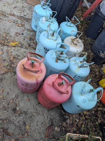 Projects. Empty freon cylinders tanks.  Greenguy. 1