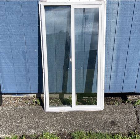 White vinyl window 56” x 30” 1
